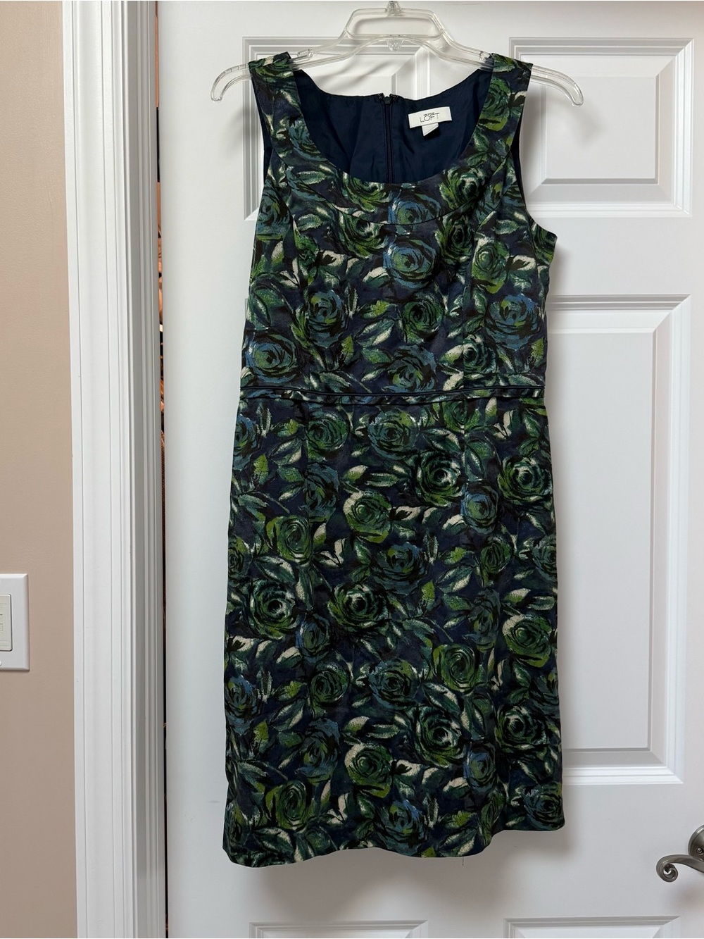 Ann Taylor LOFT sleeveless sheath dress features a green & blue floral print